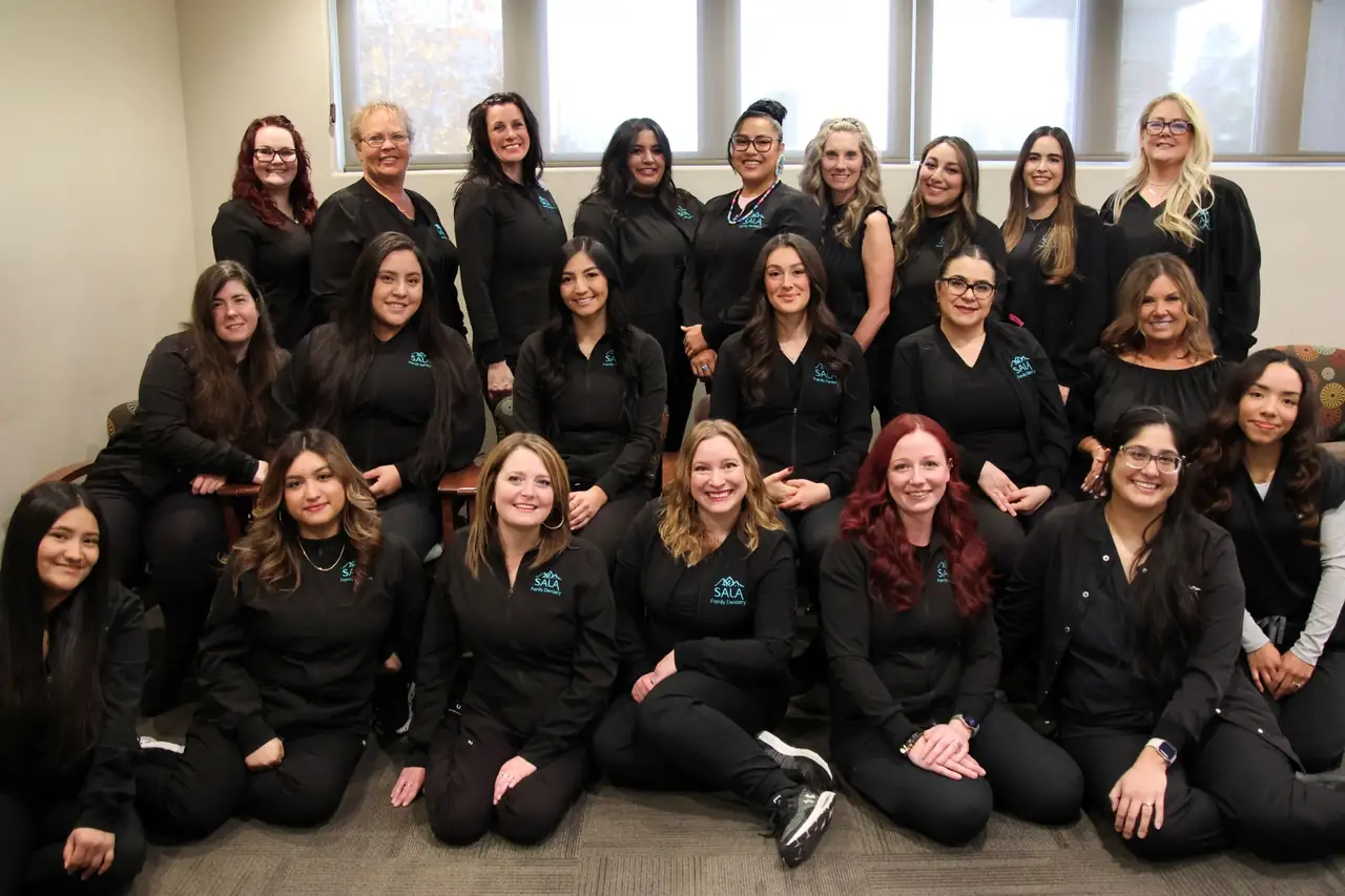 The Sala Family Dentistry team together inside the practice on Summit Ridge Drive, Reno.