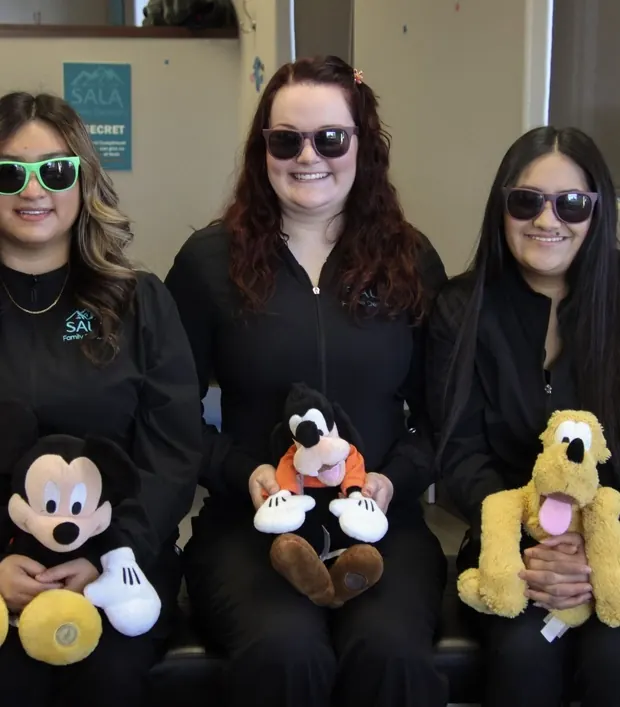 The pediatric team, with a little help from Mickey, Goofy and Pluto.